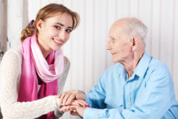 caregiver and patient smiling