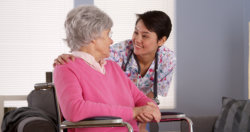 caretaker and patient looking each other